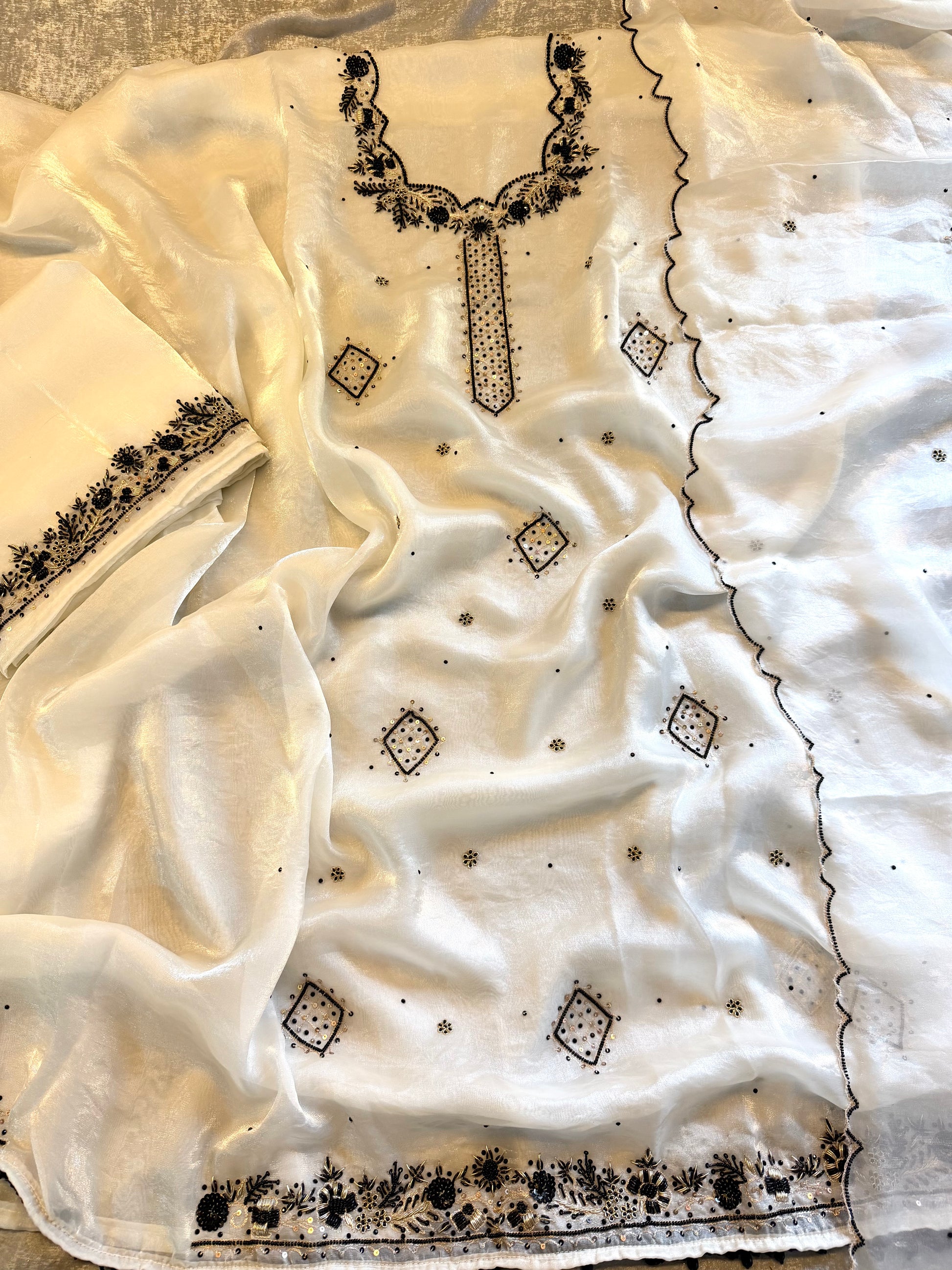 Black & white suit |  | Karishma Emporium | Elegance in Making Pure Zardozi Women wear